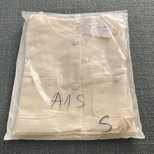 Cream Textured Two Piece Skirt and Jacket set